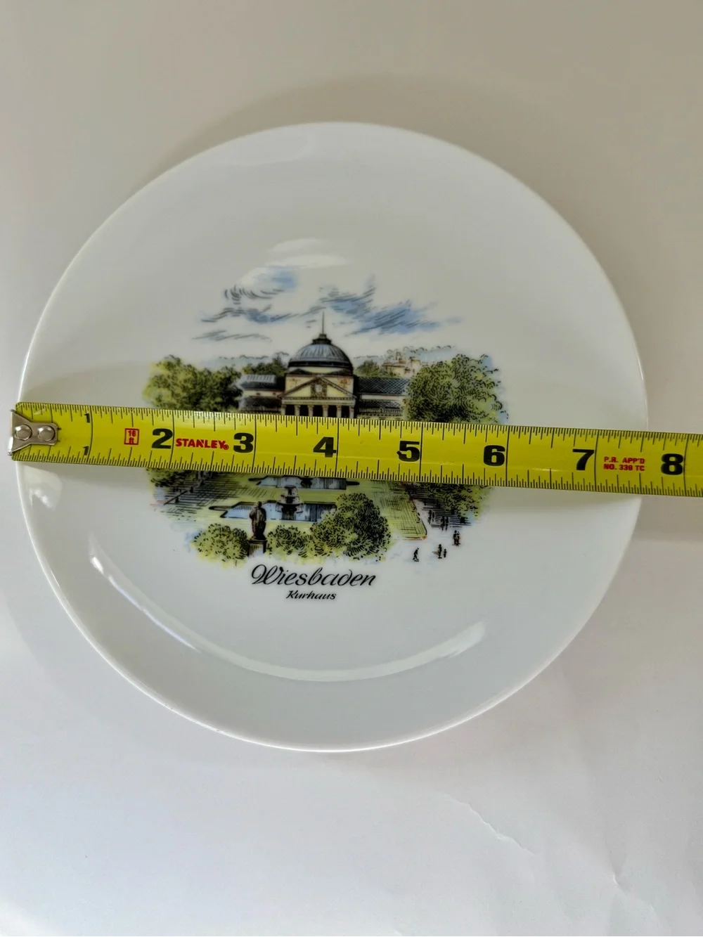 La Kaiser White Plate with Green and Blue Scenic Kurhaus Print